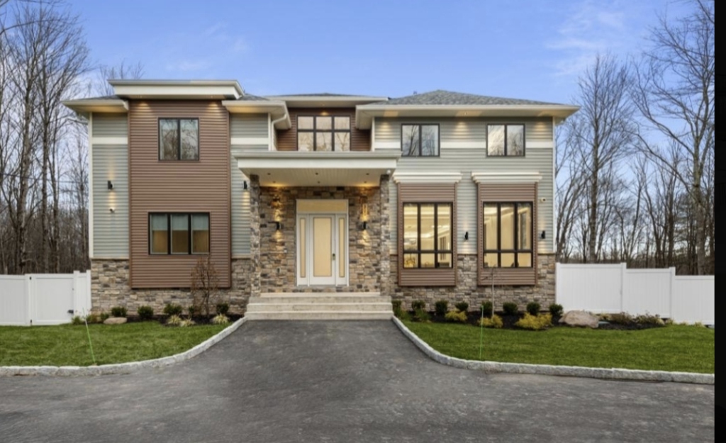 Oak Rest House modern architectural stone and wood exterior facade