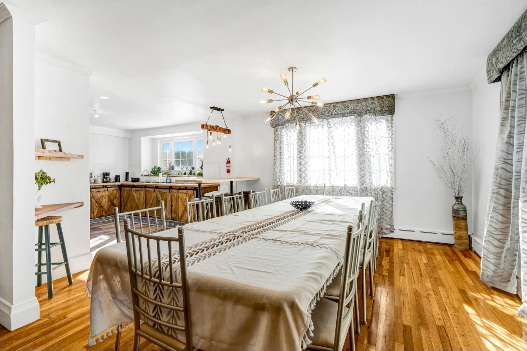Grand dining room prepared with banquet table and natural light